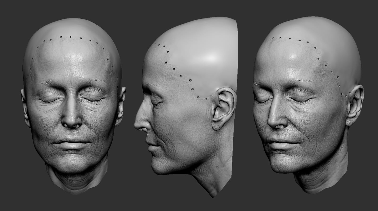 A 3D digital model of a human head, created using 3D scanning, is shown from three angles: front, profile, and three-quarter view. The model features closed eyes, detailed skin texture, and small dots on the forehead and scalp.