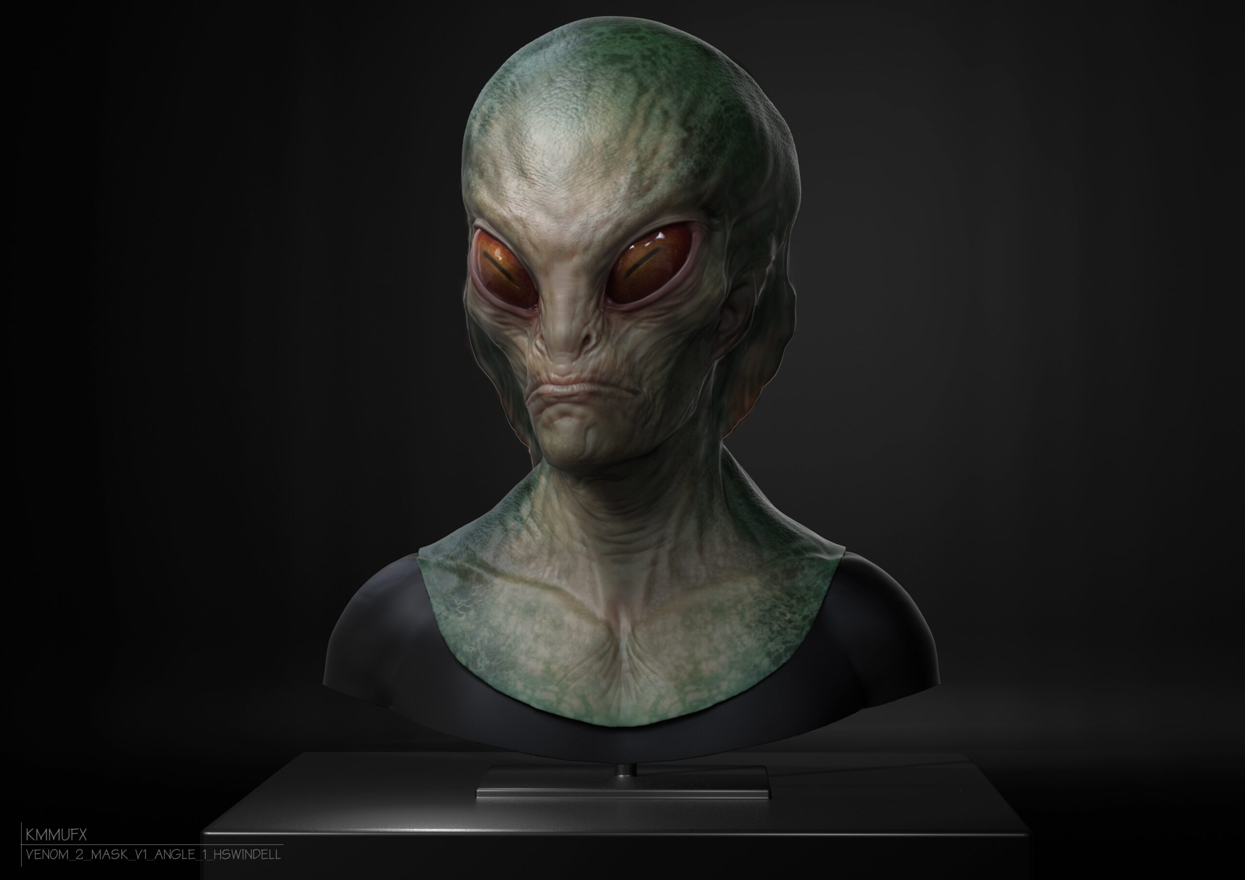 A detailed bust concept design of a green-skinned alien with large, orange almond-shaped eyes, prominent cheekbones, and a serious expression, displayed on a stand against a dark background.